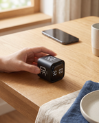 Main retournant le Cube Focus pour lancer une session de concentration