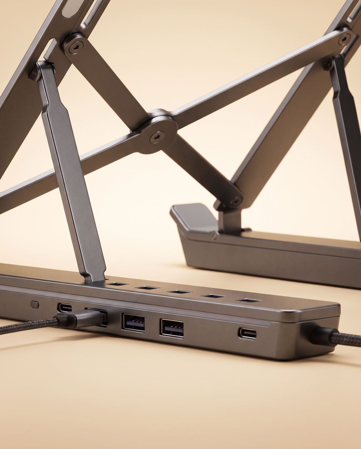 Gros plan des ports USB et de la charnière du support PC portable